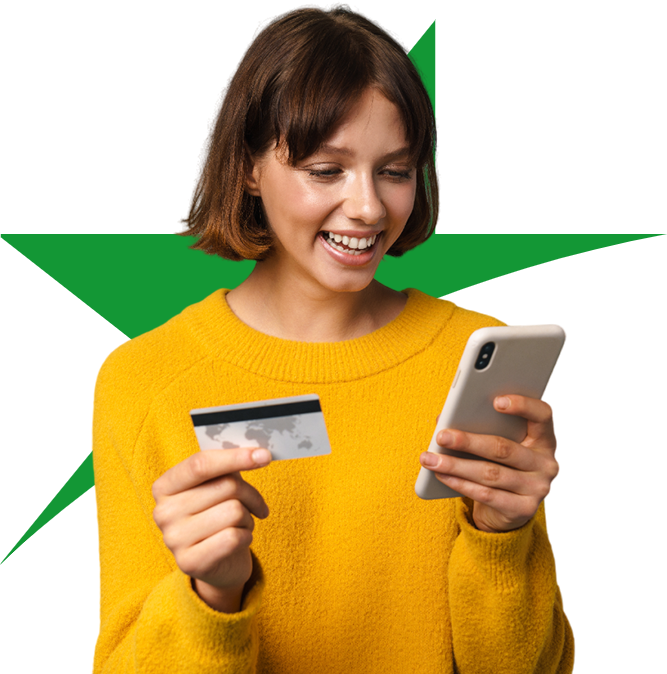 Happy woman holding card an cellphone for Greater State Bank app